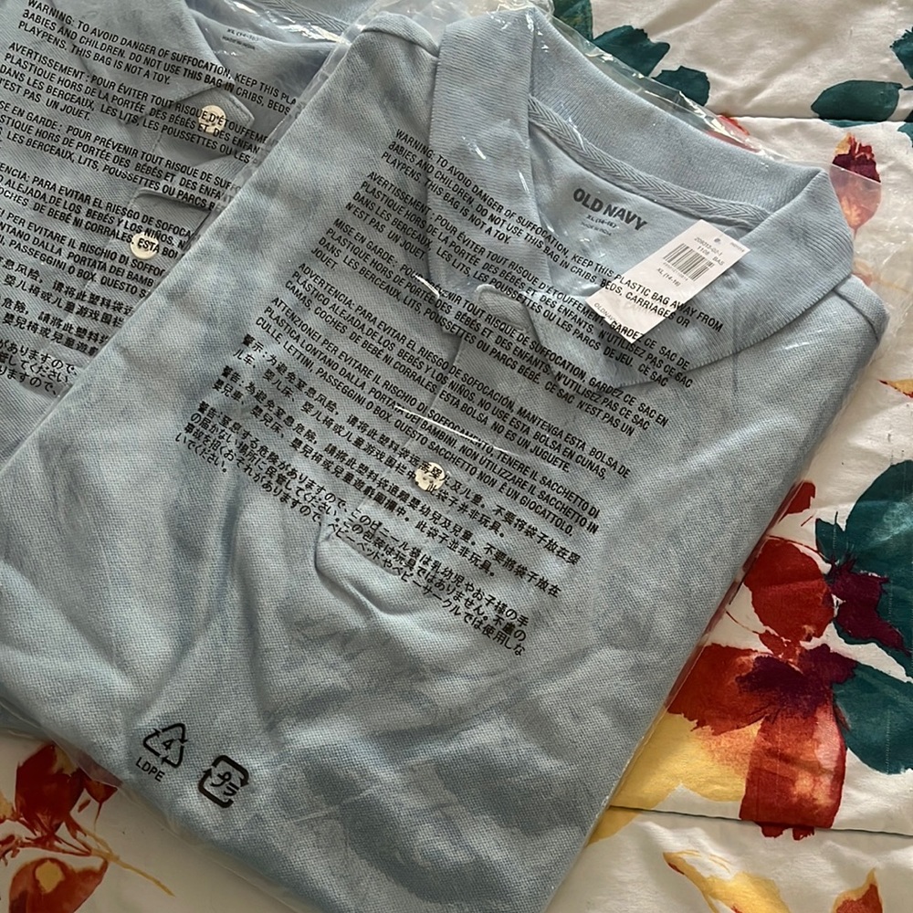 4 light blue uniform shirts